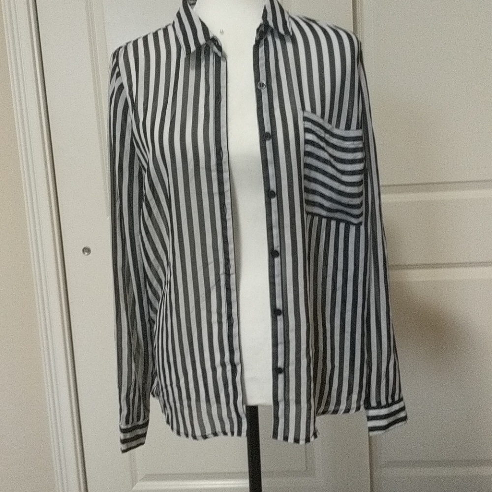 A black and white striped button down blouse